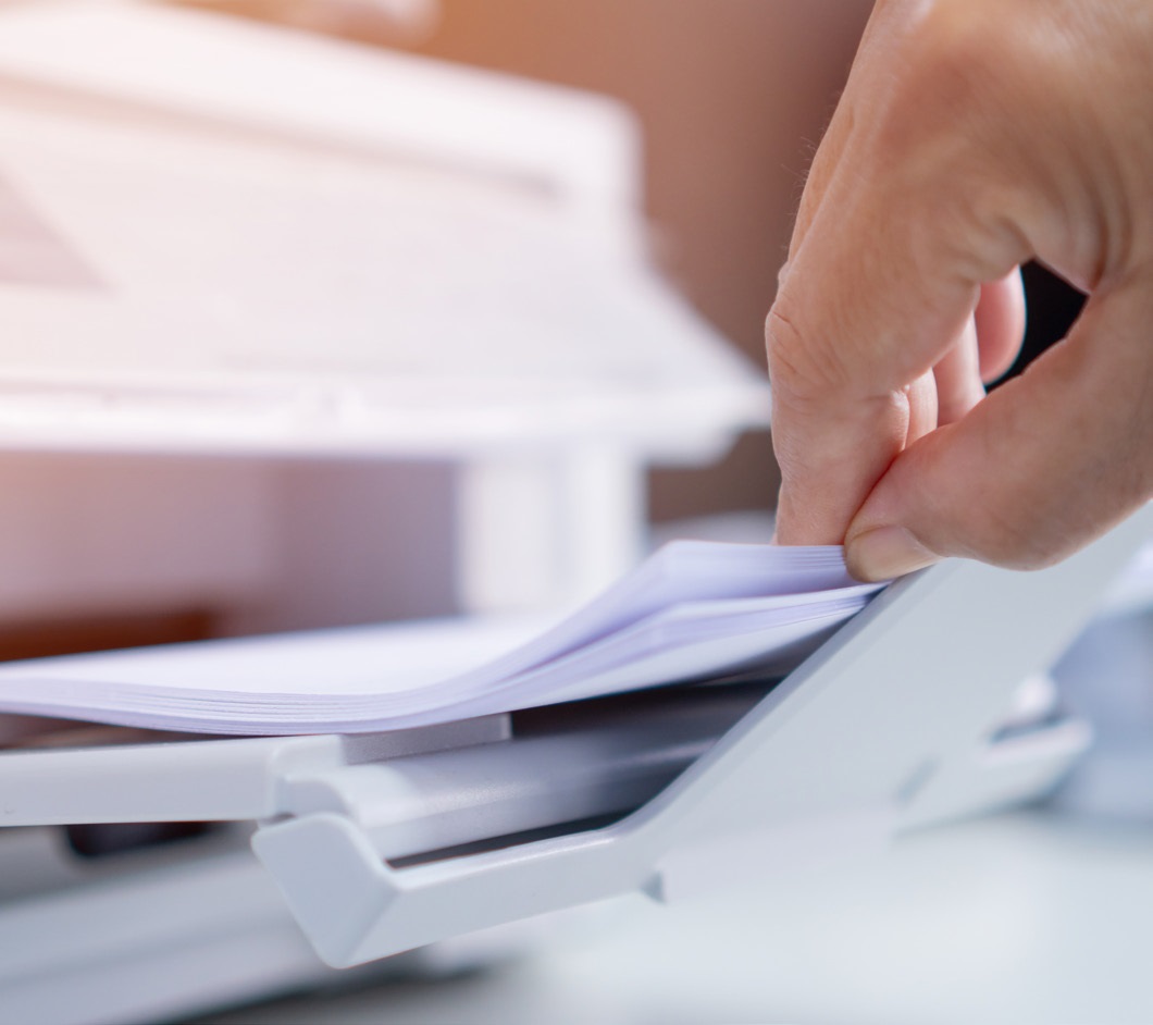 Production Print magnifying glass over photos