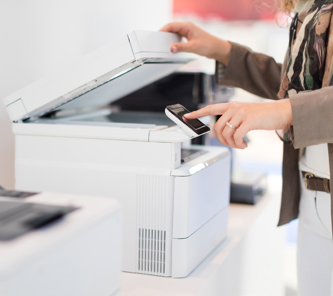 woman using office printer copier