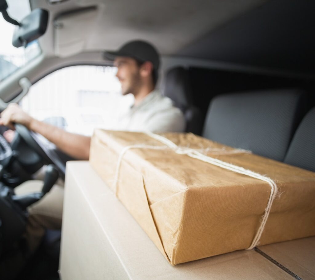 delivery man driving packages