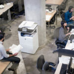 isometric workers in office cement floor work stations hp photocopier printer