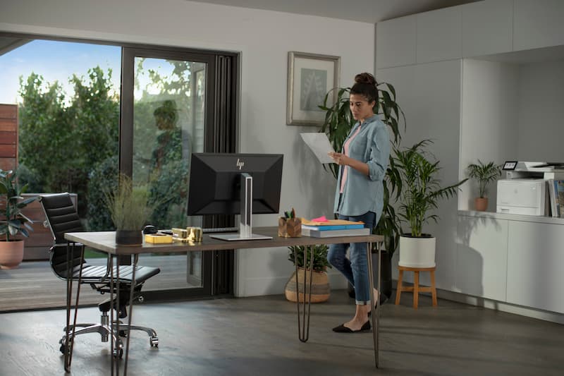 hp printer monitor woman in home office