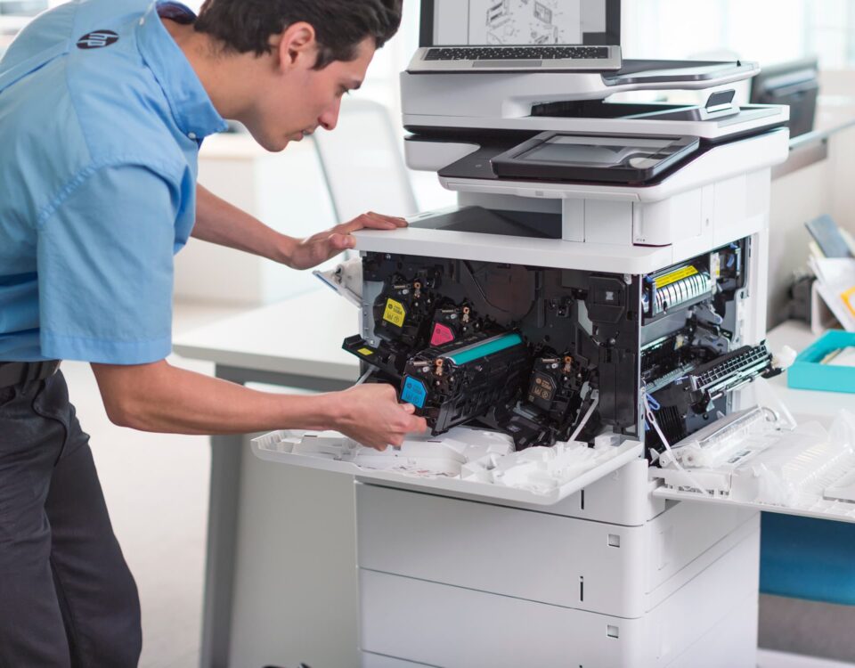 apogee engineer replacing printer toner