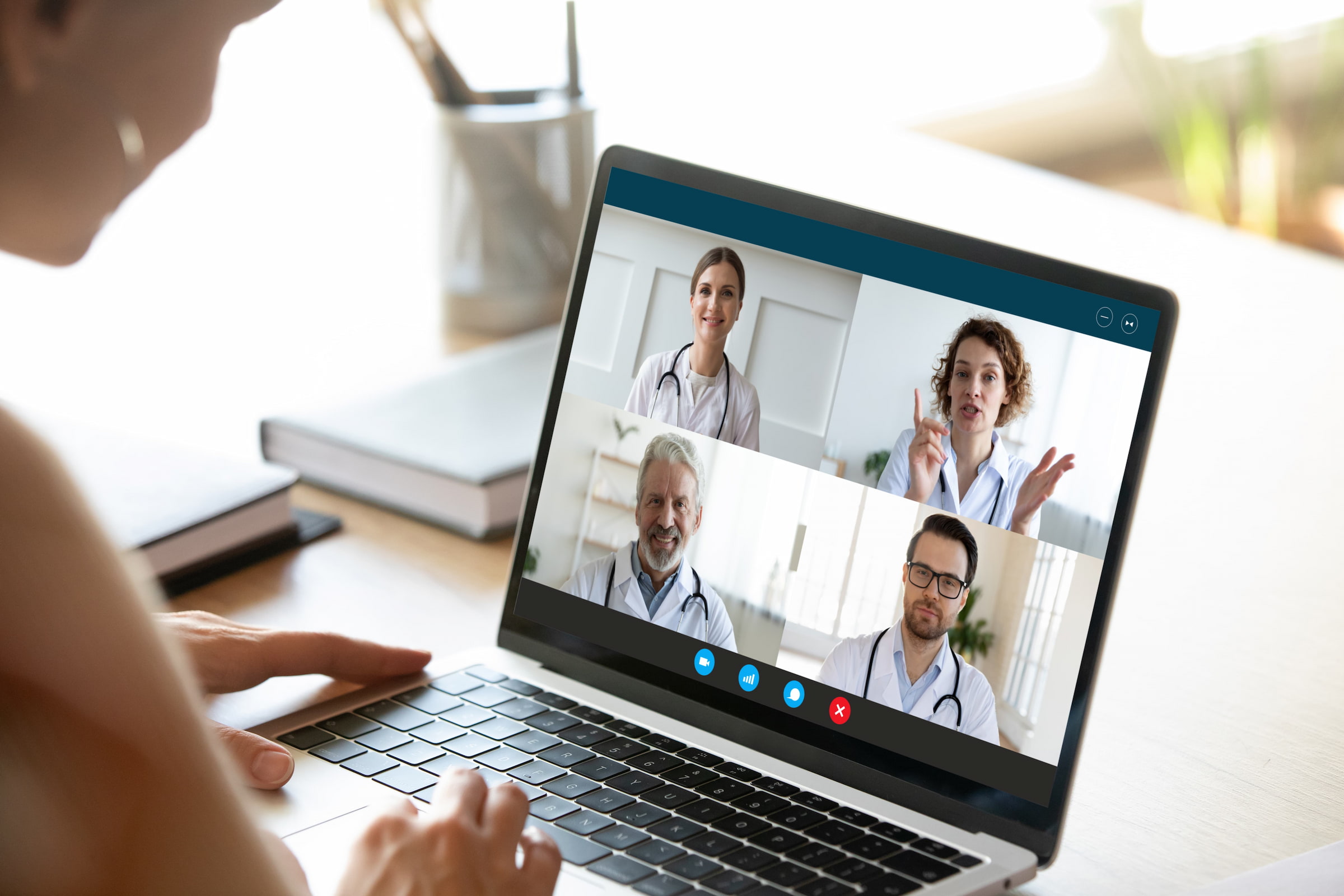 medical online conference video meeting laptop