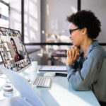 woman video conference team in office pc