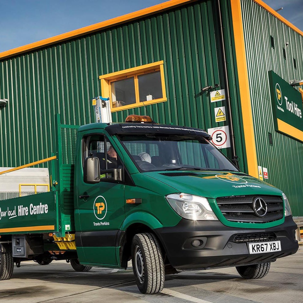 Travis Perkins exterior and vehicle green and yellow