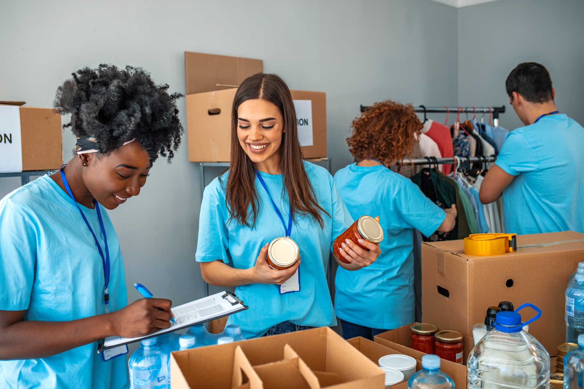 woman unpacking boxes in charity drive