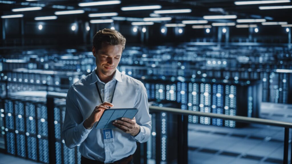 employee checking data on ipad