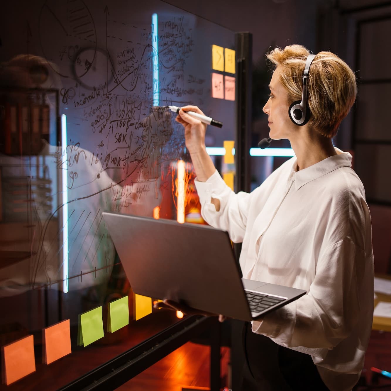 square-version-of-woman-working-on-transparent-whiteboard