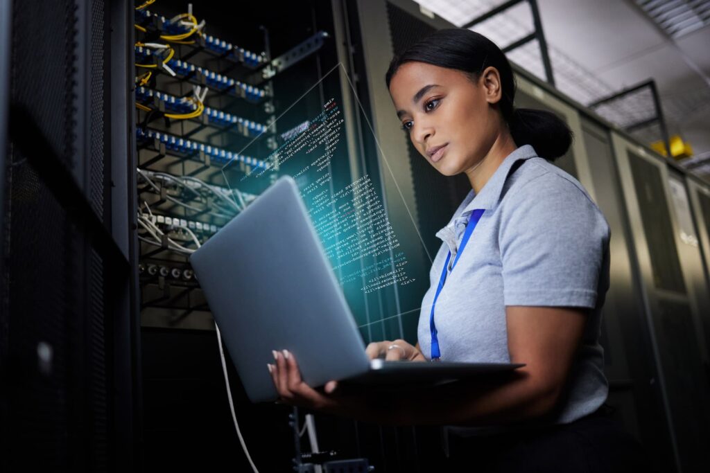 young asian woman apprentice using laptop