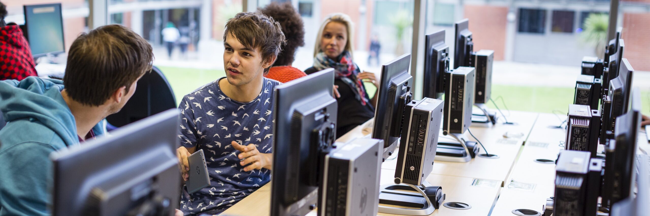 Students all using the HP t410 in a computer lab thin rectangle