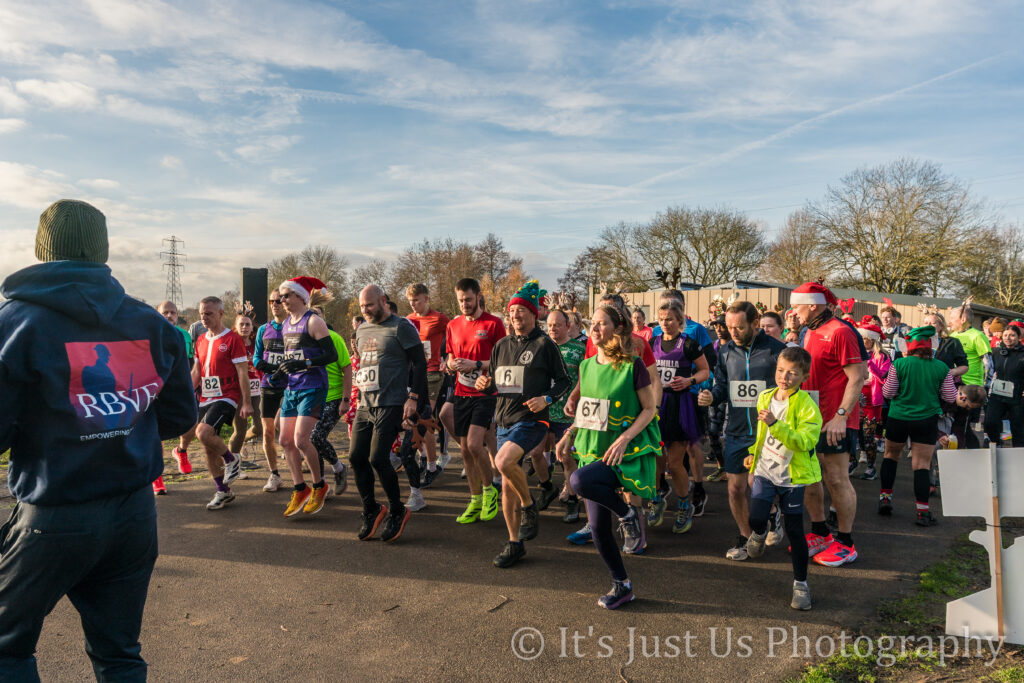 Participants warming up for Rudolph Fun Run