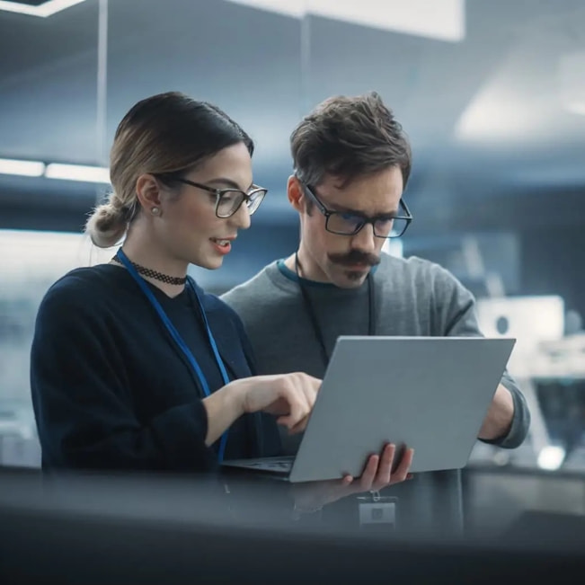 Production Print magnifying glass over photos